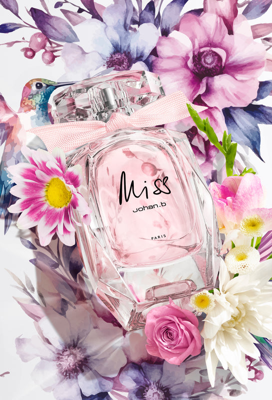 A new perfume for woman in a unique multifaceted bottle, adorned with a pink ribbon, in a flower bouquet